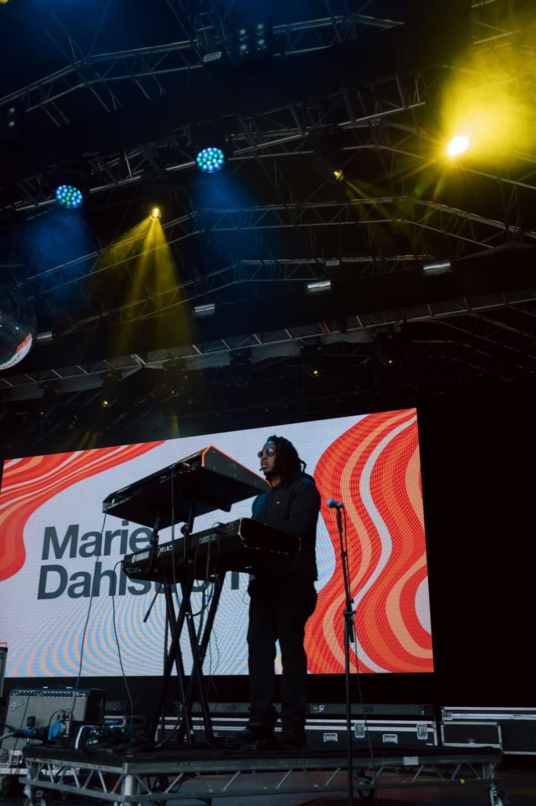 Dan on keys under stage lights during a Marie Dahlstrøm set